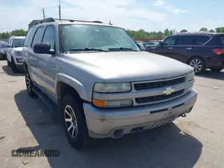 2005 Chevrolet Tahoe Z71 z VIN 1GNEC13T65R162332, wystawiony jako IAAI lot #42058892 z przebiegiem 271 775 mil mil oraz . Historia ofert i sprzedaży dostępna na DreamBid. Obrazek 1.