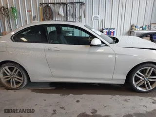 2016 BMW 2 Series 228i xDrive with VIN WBA1G9C53GVX97088, listed as a IAAI auction lot 41617710 with 72,978 mi miles. Bid and sale history available at carsss.com. Image 14.