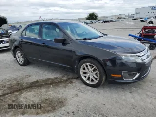 2012 Ford Fusion SEL with VIN 3FAHP0JG8CR274308, listed as a Copart auction lot 61644845 with 209,603 mi miles and Salvage title. Bid and sale history available at DreamBid. Image 4.