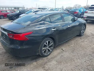 2016 Nissan Maxima Platinum with VIN 1N4AA6AP9GC391227, listed as a IAAI auction lot 42013542 with 169,016 mi miles and . Bid and sale history available at DreamBid. Image 4.