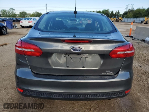2016 Ford Focus SE with VIN 1FADP3F21GL403961, listed as a Copart auction lot 58027305 with 84,020 mi miles and Salvage title. Bid and sale history available at DreamBid. Image 6.