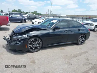 2021 BMW 3 Series 330i with VIN 3MW5R1J02M8B50832, listed as a IAAI auction lot 42032570 with 70,534 mi miles and . Bid and sale history available at DreamBid. Image 14.