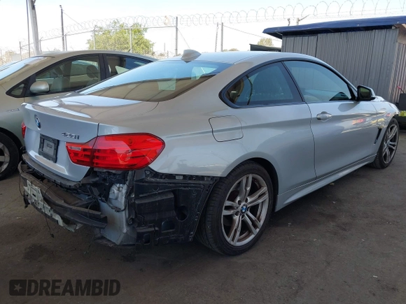 2014 BMW 4 Series 428i with VIN WBA3N7C58EF719514, listed as a IAAI auction lot 42310537 with 82,573 mi miles and . Bid and sale history available at DreamBid. Image 4.