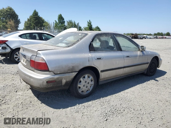 1997 Honda Accord LX with VIN 1HGCD5630VA007257, listed as a Copart auction lot 66043264 with 265,262 mi miles and Salvage Title. Bid and sale history available at DreamBid. Image 3.