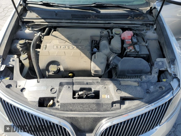 2013 Lincoln MKS with VIN 1LNHL9EK0DG612314, listed as a Copart auction lot 52901685 with 124,828 mi miles and Salvage title. Bid and sale history available at DreamBid. Image 11.