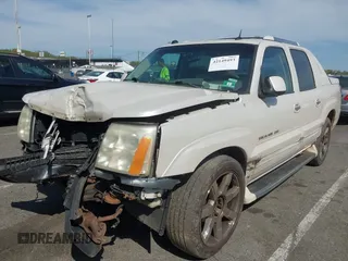 2004 Cadillac Escalade EXT z VIN 3GYEK62N34G304883, wystawiony jako IAAI lot #42149493 z przebiegiem 177 911 mil mil oraz . Historia ofert i sprzedaży dostępna na DreamBid. Obrazek 2.