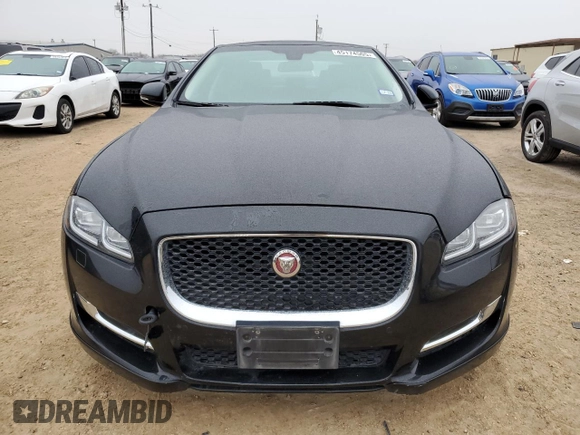 2017 Jaguar XJ R-Sport with VIN SAJWA1C77H8W04956, listed as a Copart auction lot 45174505 with 142,002 mi miles and Salvage title. Bid and sale history available at DreamBid. Image 5.