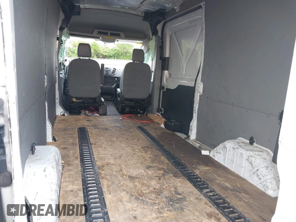 2018 Ford Transit z VIN 1FTYR2CM9JKB14054, wystawiony jako IAAI lot #42205733 z przebiegiem 263 605 mil mil oraz . Historia ofert i sprzedaży dostępna na DreamBid. Obrazek 8.