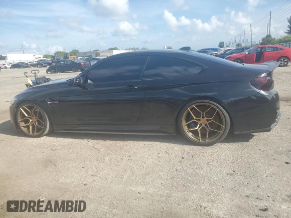 2015 BMW M4 with VIN WBS3R9C57FK332862, listed as a Copart auction lot 59395104 with 63,112 mi miles and Salvage Title. Bid and sale history available at carsss.com. Image 2.