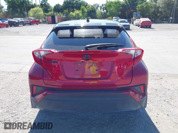 2020 Toyota C-HR LE with VIN JTNKHMBX3L1066720, listed as a IAAI auction lot 42042139 with 98,925 mi miles and . Bid and sale history available at DreamBid. Image 16.