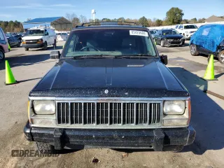 1996 Jeep Cherokee z VIN 1J4FN78S8TL160974, wystawiony jako Copart lot #83425604 z przebiegiem 336 313 mil mil oraz Szkoda całkowita • Salvage title. Historia ofert i sprzedaży dostępna na DreamBid. Obrazek 5.