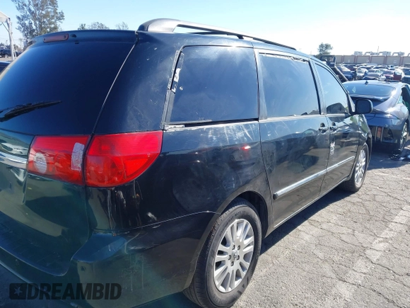 2009 Toyota Sienna XLE with VIN 5TDZK22C69S273555, listed as a IAAI auction lot 41276221 with 129,160 mi miles and . Bid and sale history available at DreamBid. Image 4.