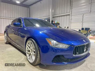 2014 Maserati Ghibli S Q4 with VIN ZAM57RTA0E1087454, listed as a Copart auction lot 62614845 with 58,880 mi miles and Salvage title. Bid and sale history available at DreamBid. Image 1.