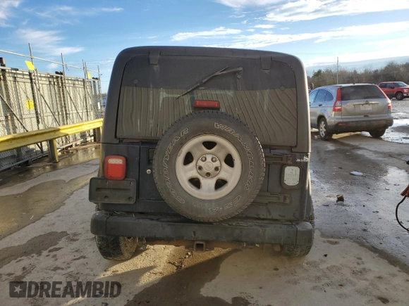 2006 Jeep Wrangler Sport Right Hand Drive with VIN 1J4F449S16P741407, listed as a Copart auction lot 88804015 with 182,059 mi miles and Salvage Title. Bid and sale history available at carsss.com. Image 6.