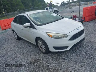 2015 Ford Focus SE z VIN 1FADP3F23FL203050, wystawiony jako IAAI lot #42503466 z przebiegiem 117 908 mil mil oraz . Historia ofert i sprzedaży dostępna na DreamBid. Obrazek 1.
