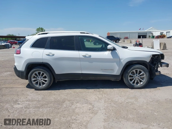 2019 Jeep Cherokee Latitude with VIN 1C4PJLCB9KD285111, listed as a IAAI auction lot 42044469 with 123,947 mi miles and . Bid and sale history available at DreamBid. Image 14.