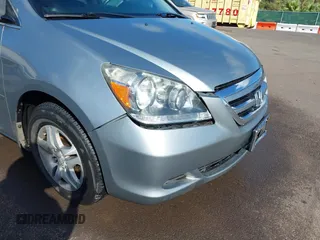 2007 Honda Odyssey EX-L with VIN 5FNRL38677B021464, listed as a IAAI auction lot 41568582 with 131,359 mi miles and . Bid and sale history available at DreamBid. Image 6.