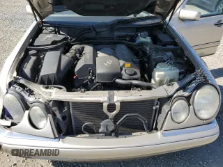 1999 Mercedes-Benz E-Class with VIN WDBJF65H5XA804902, listed as a Copart auction lot 73704634 with 92,411 mi miles and Salvage Title. Bid and sale history available at carsss.com. Image 11.