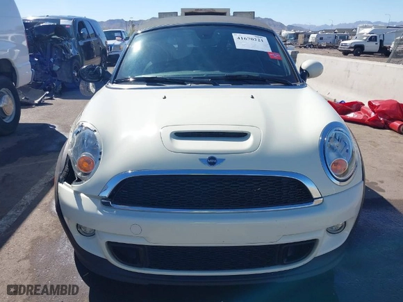2015 MINI Cooper Roadster S with VIN WMWSY3C51FT595455, listed as a IAAI auction lot 41670221 with NaN miles. Bid and sale history available at carsss.com. Image 12.