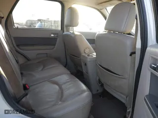 2009 Mercury Mariner Hybrid with VIN 4M2CU29399KJ05674, listed as a IAAI auction lot 40843807 with 194,987 mi miles. Bid and sale history available at carsss.com. Image 8.