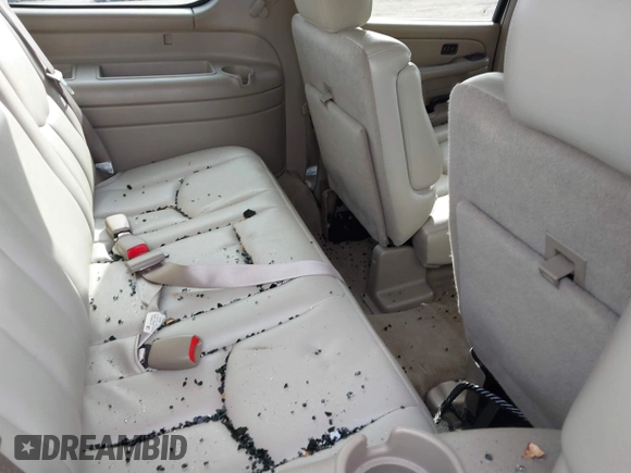 2005 Chevrolet Suburban LT with VIN 3GNFK16Z95G159688, listed as a IAAI auction lot 41492030 with 233,009 mi miles and . Bid and sale history available at DreamBid. Image 7.