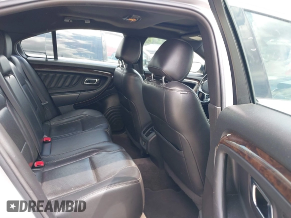 2013 Ford Taurus Limited with VIN 1FAHP2F8XDG117448, listed as a IAAI auction lot 39585596 with 150,747 mi miles and . Bid and sale history available at DreamBid. Image 8.
