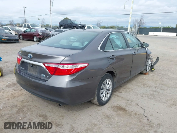 2017 Toyota Camry Hybrid LE with VIN 4T1BD1FK9HU216117, listed as a IAAI auction lot 41710989 with 99,595 mi miles. Bid and sale history available at carsss.com. Image 4.