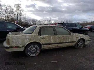 1989 Oldsmobile Cutlass z VIN 1G3AM51W0KG347458, wystawiony jako Copart lot #86949074 z przebiegiem 30 169 mil mil oraz Tytuł czysty. Historia ofert i sprzedaży dostępna na DreamBid. Obrazek 3.
