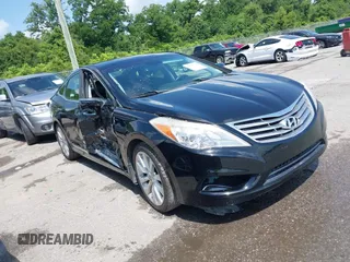 2013 Hyundai Azera z VIN KMHFH4JG0DA310957, wystawiony jako IAAI lot #42451780 z przebiegiem 82 827 mil mil oraz . Historia ofert i sprzedaży dostępna na DreamBid. Obrazek 1.