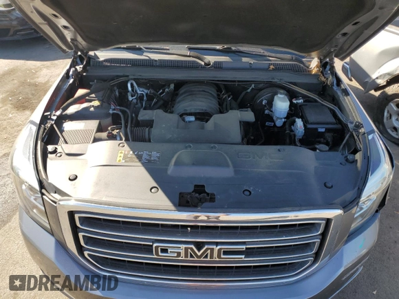 2019 GMC Yukon SLE with VIN 1GKS2AKC4KR334387, listed as a Copart auction lot 77267774 with 62,821 mi miles and Salvage Title. Bid and sale history available at carsss.com. Image 12.