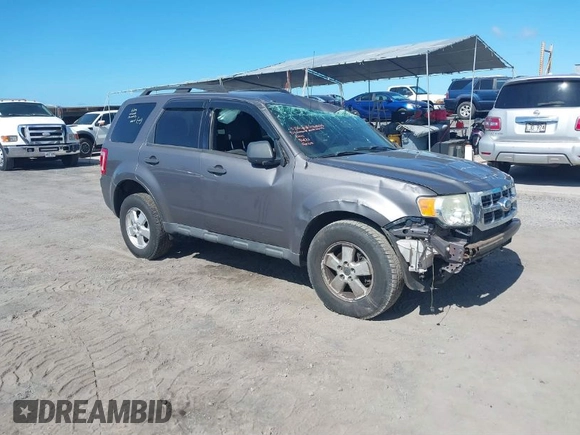 2011 Ford Escape XLT with VIN 1FMCU0D79BKB79697, listed as a IAAI auction lot 41265677 with 138,026 mi miles. Bid and sale history available at carsss.com. Image 1.