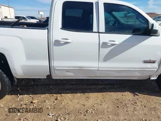 2018 Chevrolet Silverado 1500 LT with VIN 1GCRCREC4JZ368426, listed as a IAAI auction lot 41343347 with 114,821 mi miles and . Bid and sale history available at DreamBid. Image 21.