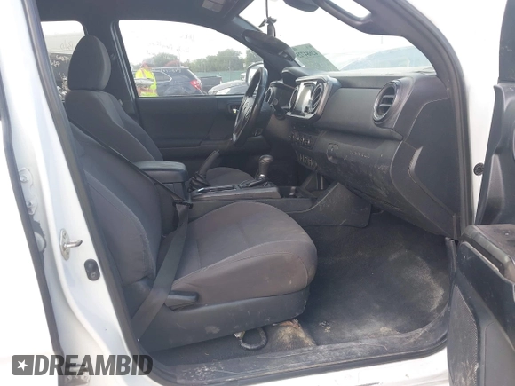 2018 Toyota Tacoma SR with VIN 3TMCZ5AN6JM138747, listed as a IAAI auction lot 42684725 with 144,725 mi miles and . Bid and sale history available at DreamBid. Image 5.