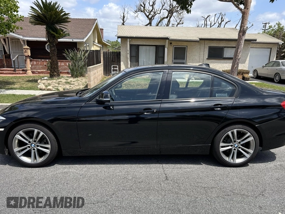2014 BMW 3 Series 328i with VIN WBA3C1C52EK108680, listed as a IAAI auction lot 42153830 with 73,464 mi miles. Bid and sale history available at carsss.com. Image 13.