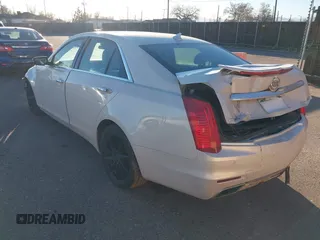 2014 Cadillac CTS Luxury AWD z VIN 1G6AX5SX3E0149360, wystawiony jako IAAI lot #41020479 z przebiegiem 98 917 mil mil oraz . Historia ofert i sprzedaży dostępna na DreamBid. Obrazek 3.