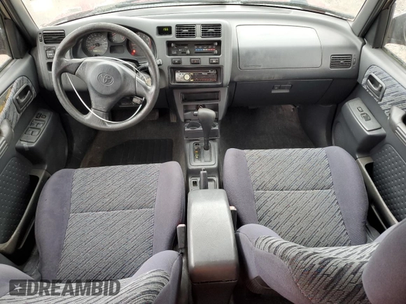 1999 Toyota RAV4 with VIN JT3GP10V4X7043368, listed as a Copart auction lot 74942864 with 367,714 mi miles and Salvage Title. Bid and sale history available at DreamBid. Image 8.