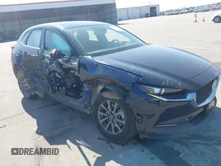 2023 Mazda CX-30 S with VIN 3MVDMBAM6PM579780, listed as a IAAI auction lot 41780720 with 32,603 mi miles and . Bid and sale history available at DreamBid. Image 1.