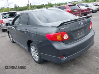 2009 Toyota Corolla with VIN 1NXBU40E39Z065572, listed as a IAAI auction lot 42138980 with 195,822 mi miles. Bid and sale history available at carsss.com. Image 3.