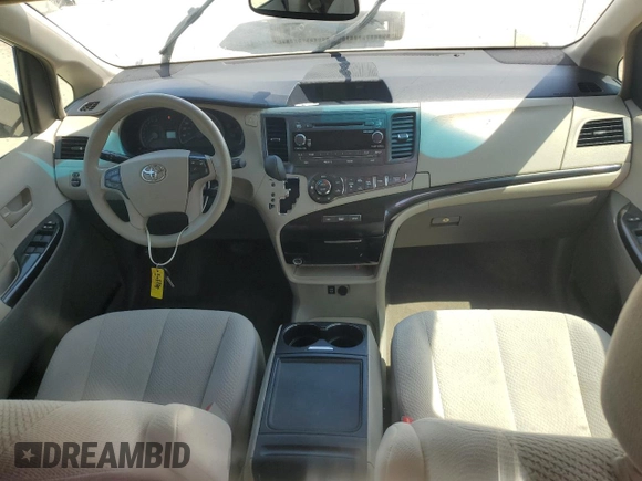 2014 Toyota Sienna LE AAS z VIN 5TDKK3DC0ES465228, wystawiony jako Copart lot #54427125 z przebiegiem 173 811 mil mil oraz Szkoda całkowita • Salvage title. Historia ofert i sprzedaży dostępna na DreamBid. Obrazek 8.