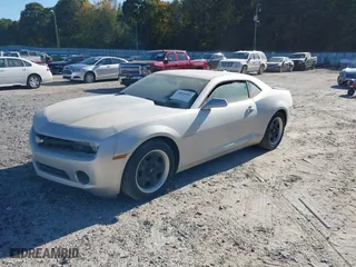 2013 Chevrolet Camaro LS with VIN 2G1FA1E36D9160663, listed as a IAAI auction lot 40649662 with 121,786 mi miles. Bid and sale history available at carsss.com. Image 2.