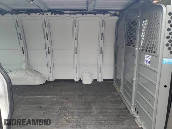 2022 Chevrolet Express Cargo с VIN 1GCWGAFPXN1217752, выставлен на аукционе Copart как лот 49950615 с пробегом 104 374 миль миль и Чистый • Clean title. История ставок и продаж доступна на DreamBid. Изображение 11.