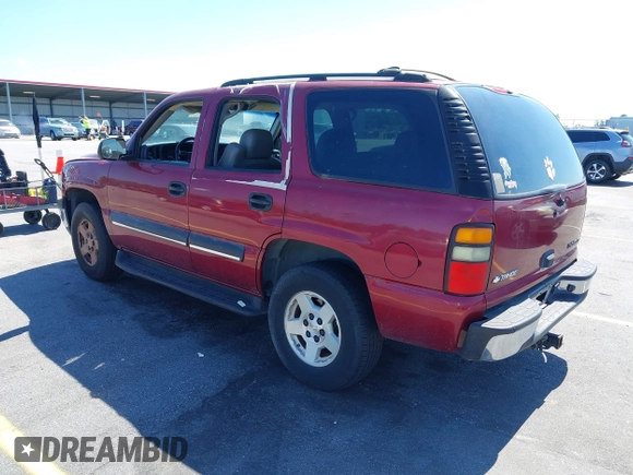 2004 Chevrolet Tahoe LS with VIN 1GNEC13Z74R207698, listed as a IAAI auction lot 42310462 with 255,218 mi miles and . Bid and sale history available at DreamBid. Image 3.