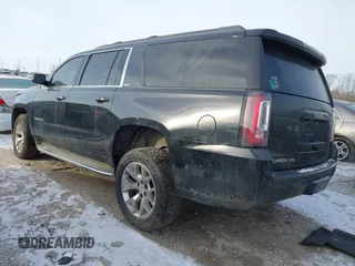 2015 GMC Yukon XL SLT with VIN 1GKS2HKC6FR257133, listed as a IAAI auction lot 41385913 with 150,238 mi miles. Bid and sale history available at carsss.com. Image 3.