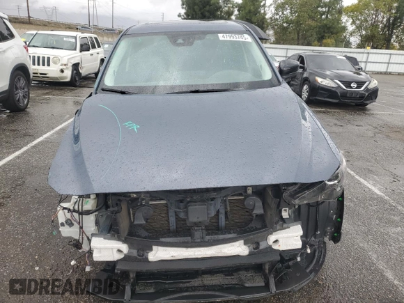 2021 Mazda CX-5 Touring with VIN JM3KFACM3M0420425, listed as a Copart auction lot 47993745 with 56,184 mi miles and Salvage Title. Bid and sale history available at carsss.com. Image 5.