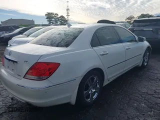 2006 Acura RL z VIN JH4KB16546C002058, wystawiony jako IAAI lot #41286711 z przebiegiem 297 234 mil mil oraz . Historia ofert i sprzedaży dostępna na DreamBid. Obrazek 4.