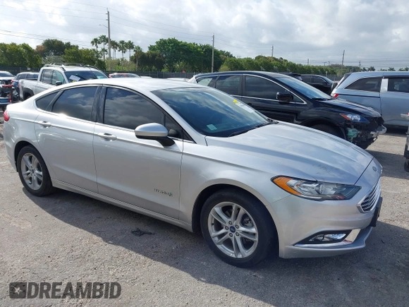 2018 Ford Fusion SE z VIN 3FA6P0LU2JR281231, wystawiony jako IAAI lot #41963083 z przebiegiem 115 434 mil mil oraz . Historia ofert i sprzedaży dostępna na DreamBid. Obrazek 1.