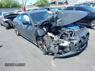 2021 BMW 4 Series M440i xDrive z VIN WBA13AR00MCF91553, wystawiony jako IAAI lot #42211853 z przebiegiem Nie podano mil oraz . Historia ofert i sprzedaży dostępna na DreamBid. Obrazek 1.