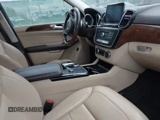2017 Mercedes-Benz GLS 450 z VIN 4JGDF6EE3HA868406, wystawiony jako IAAI lot #42046056 z przebiegiem 106 655 mil mil oraz . Historia ofert i sprzedaży dostępna na DreamBid. Obrazek 5.