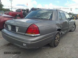 2003 Ford Crown Victoria LX z VIN 2FAFP74W73X191537, wystawiony jako IAAI lot #41711046 z przebiegiem 195 527 mil mil oraz . Historia ofert i sprzedaży dostępna na DreamBid. Obrazek 4.