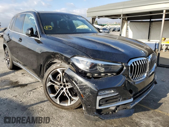 2021 BMW X5 xDrive45e with VIN 5UXTA6C09M9E08945, listed as a Copart auction lot 65677632 with 0 mi miles. Bid and sale history available at carsss.com. Image 9.